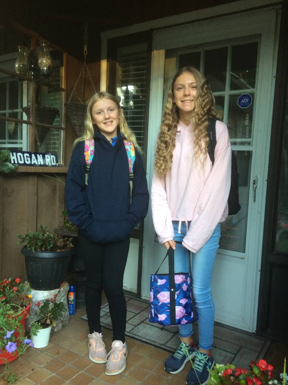Tess (left) and Grace headed off to school last week.